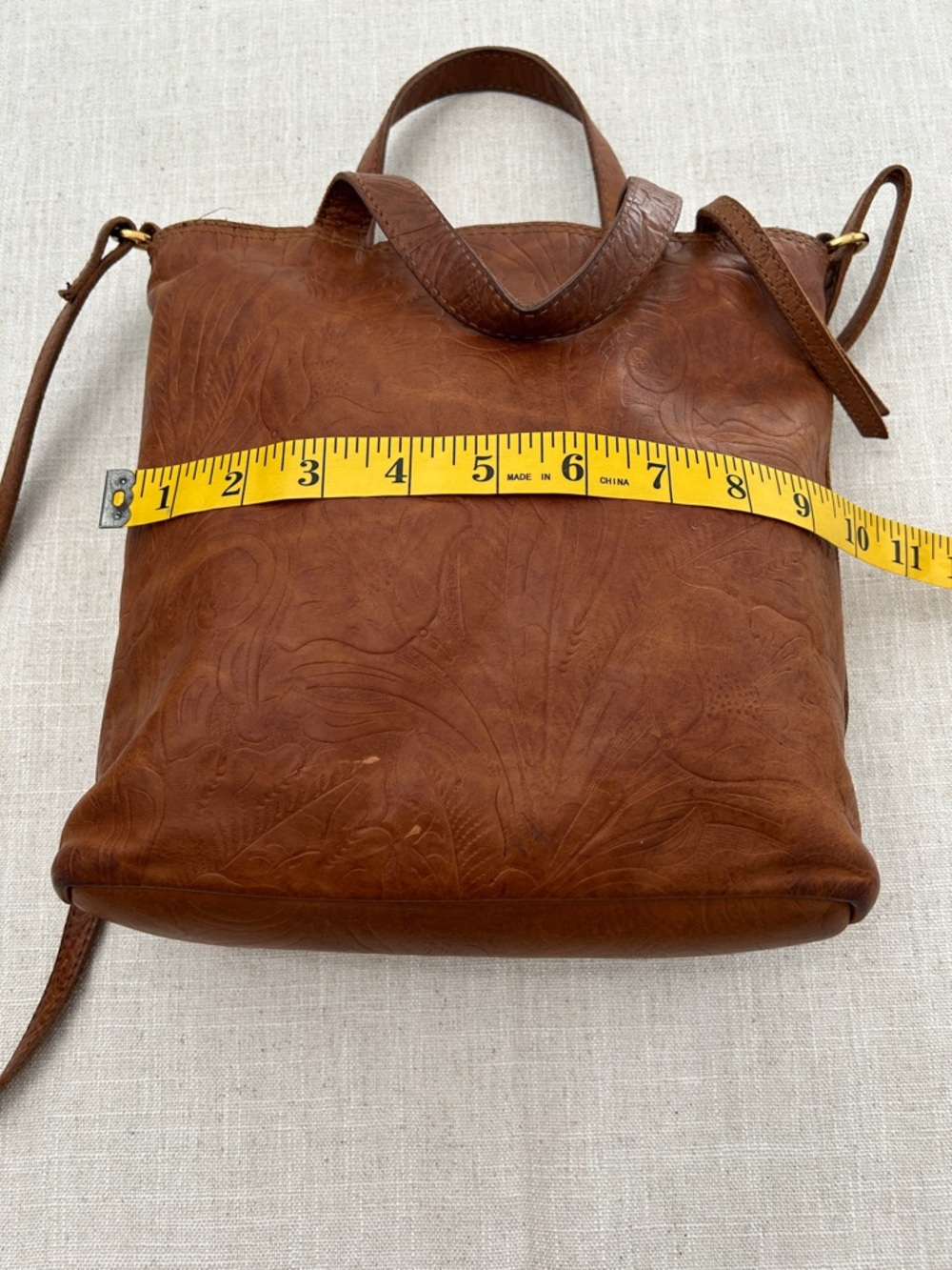 Margot Crossbody Bag Embossed Floral Leather in Cognac Brown - Picture 13 of 16